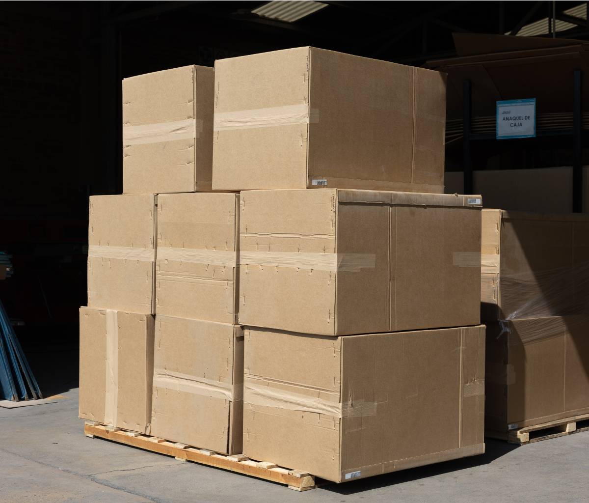 The image shows Packsize On Demand boxes that are ready for shipment.